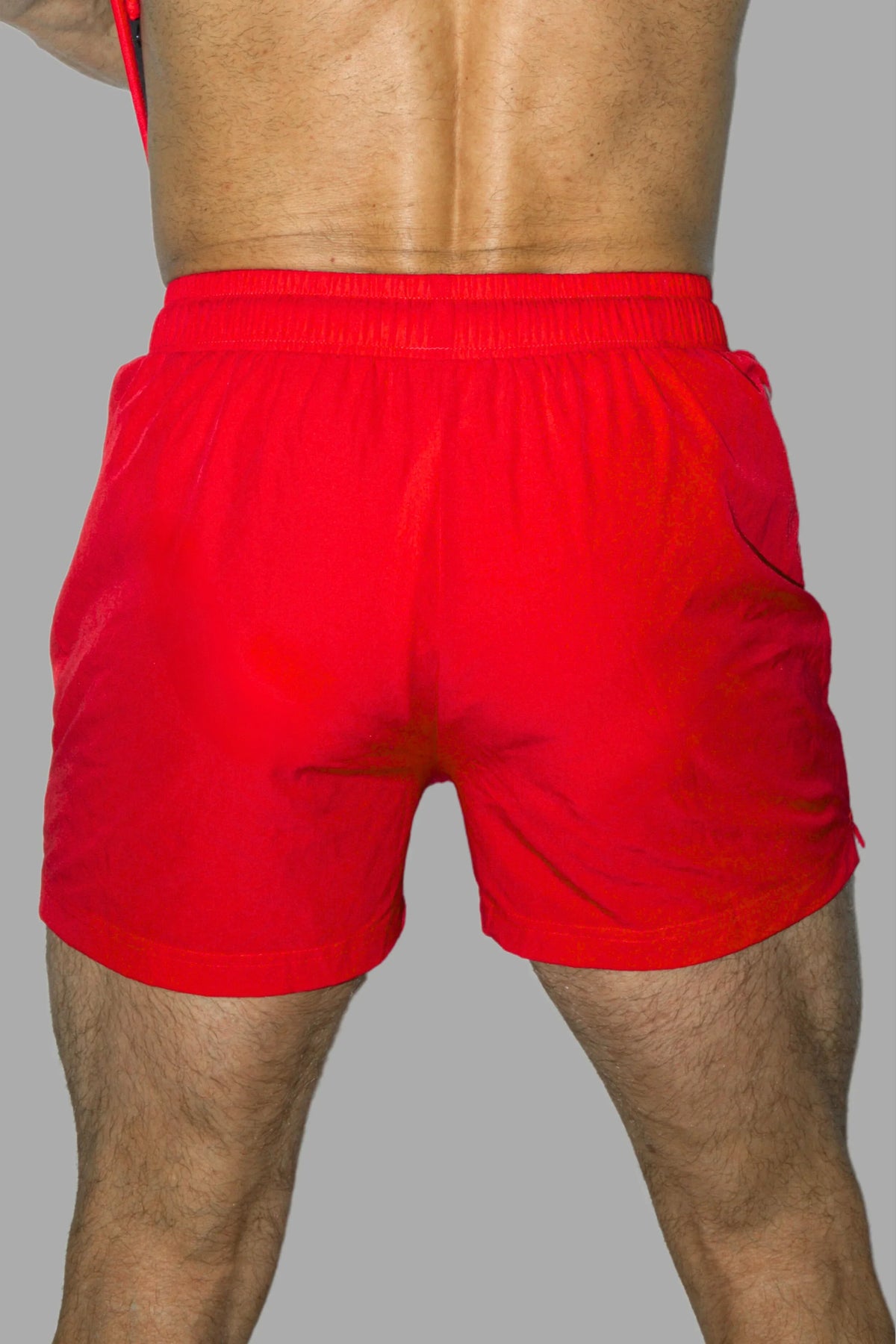 Maskulo Jedd Synther' smooth gym shorts. 2 zip pockets. Red